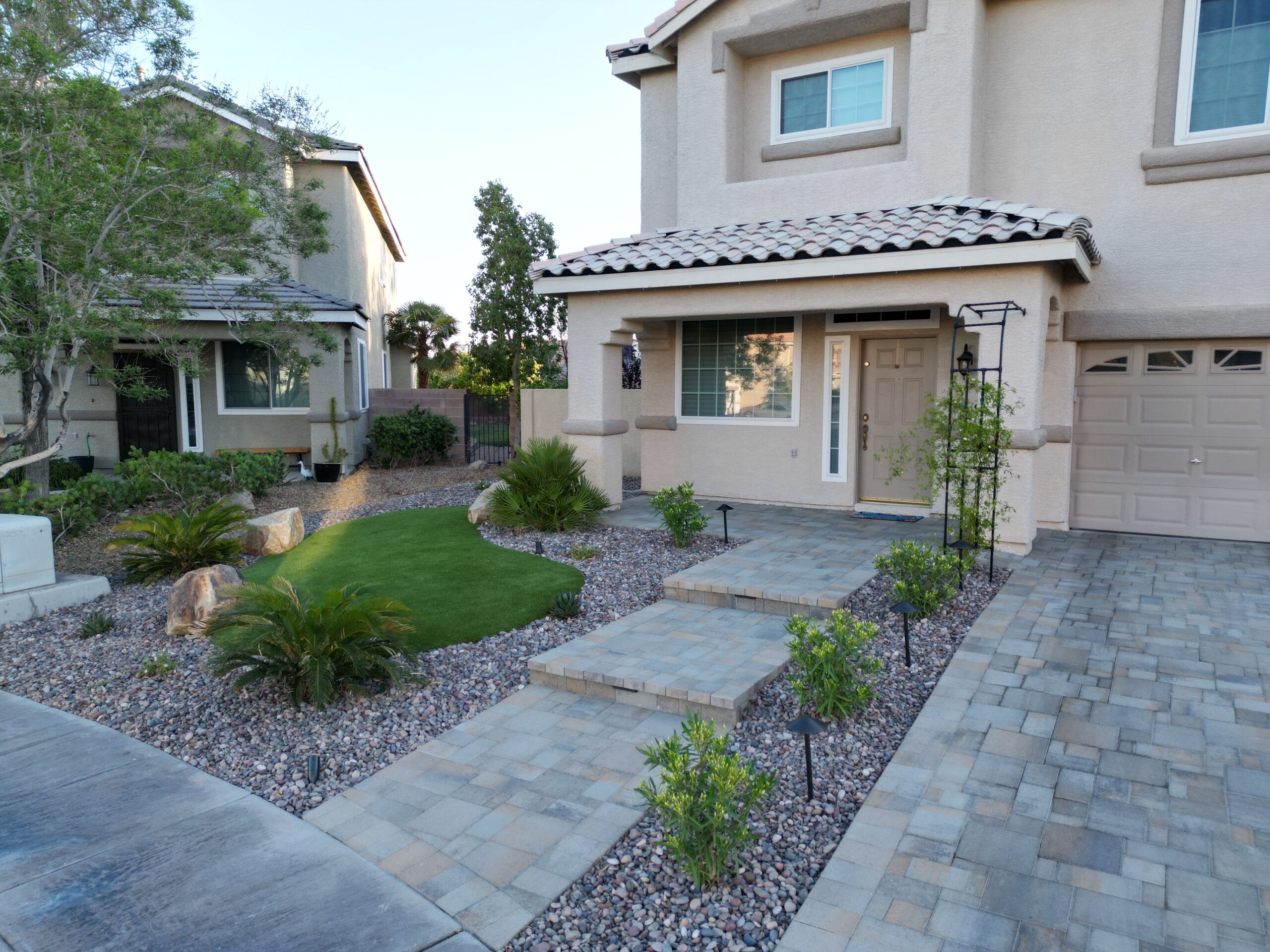 A house with a lot of landscaping in it