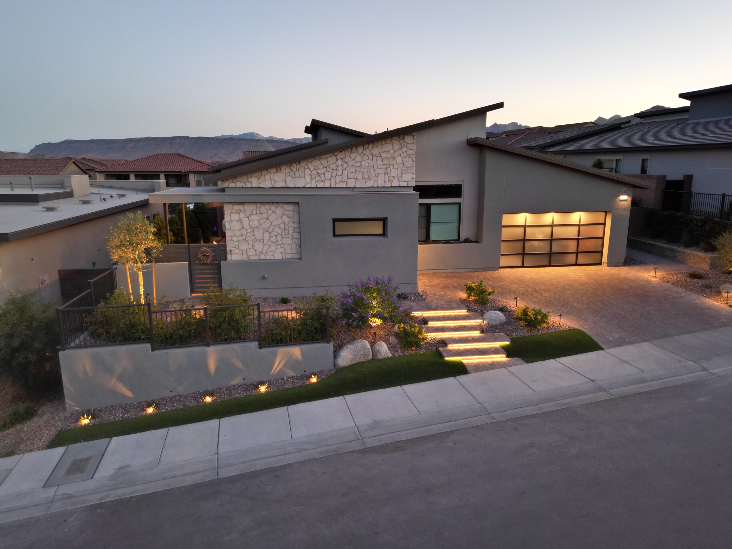 A house with lights on the front of it