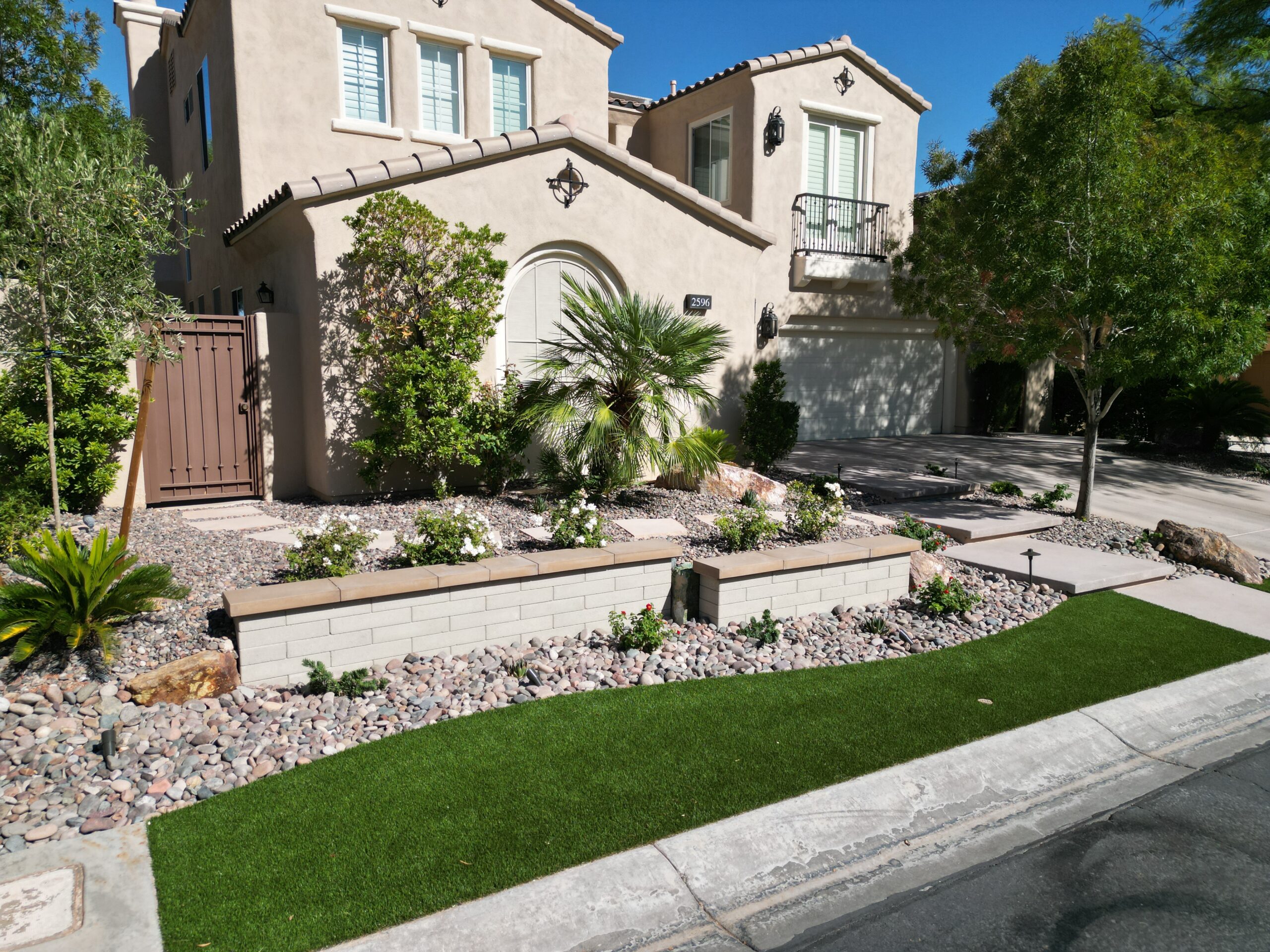 A house with a garden and a driveway